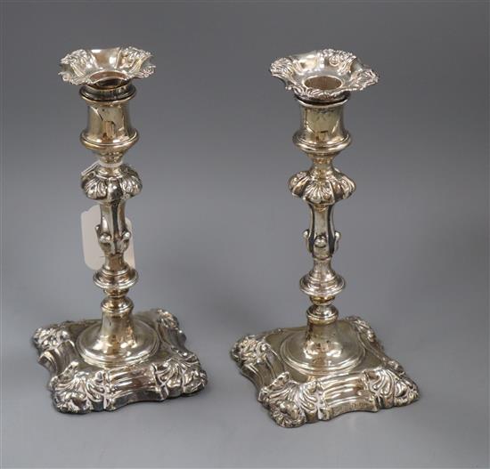 A pair of Victorian rococo style silver candlesticks, Henry Wilkinson & Co, Sheffield 1843/4, 22.5cm.